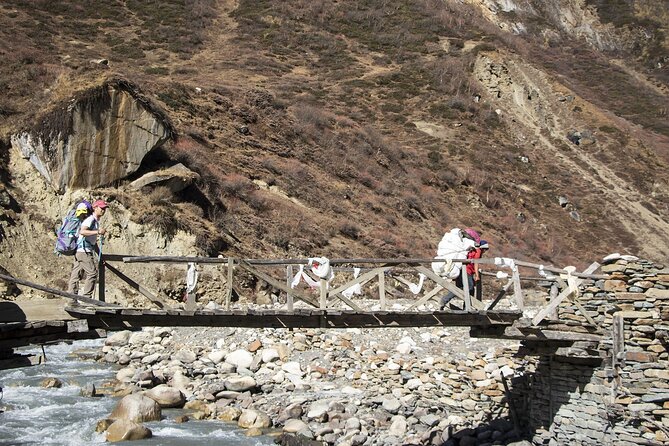 10 Days Manaslu Circuit Trek in Larke La Pass - Day 4: Bridges and mountain villages on the way to Namrung