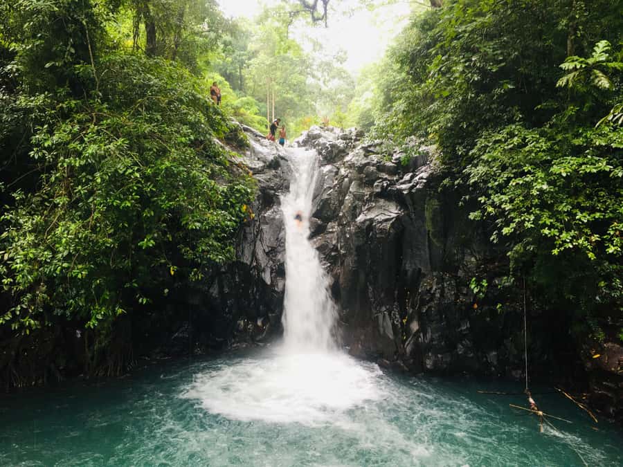 Bali: Sambangan Waterfalls Trekking, Sliding, & Jumping Trip - Twin Waterfalls and the 15-meter Pucuk jump
