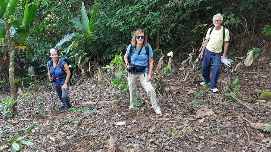 Chiang Rai 1 Day Jungle Trek with Bamboo Lunch & Local Guide - Cooling off at Huai Kaeo Waterfall