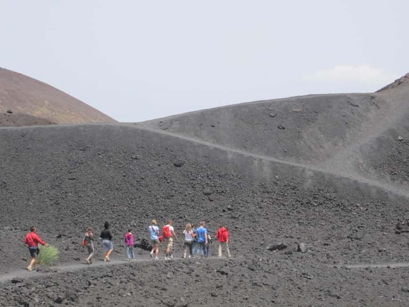 Etna: Jeep excursion and trekking suitable for everyone. Shoes and jacket provided free of charge. - Riding an authorized 4x4 toward the side craters