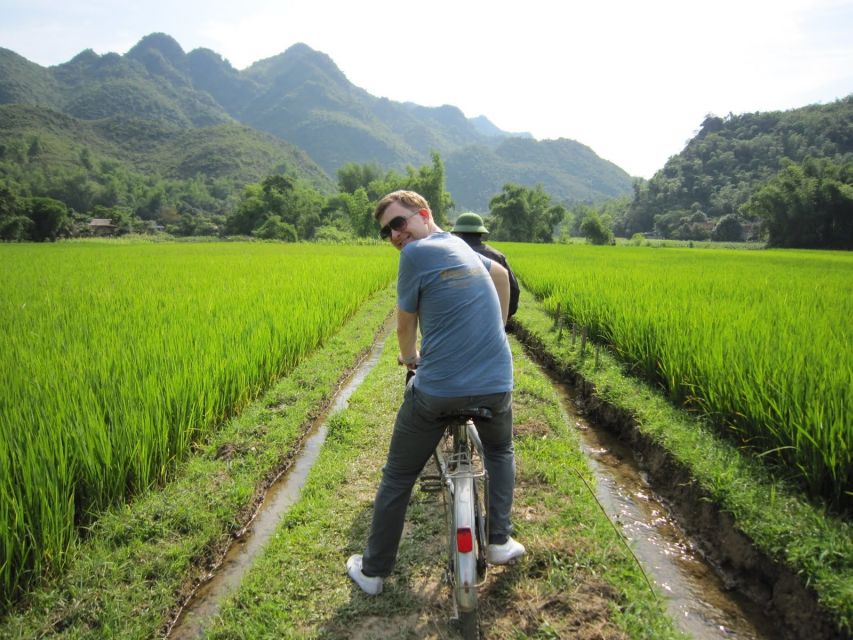 From Hanoi: Mai Chau Valley & Hill Tribes 2-Day Trek Tour - Cycling through farms, weaving villages, and quiet lanes