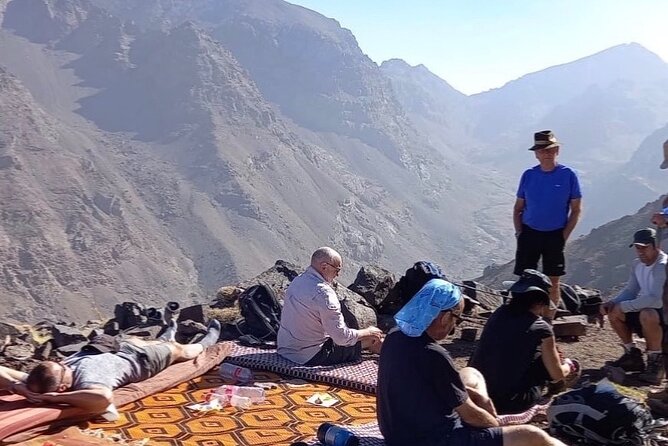 From Marrakech: Atlas Mountains Talamrout Summit day hike & Trek - The summit view toward Toubkal and the Imnane Valley