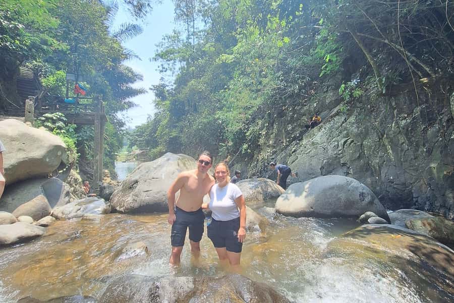 Jakarta: Sentul Pine Forest and Waterfall Trekking Tour - What to pack for a muddy, hot day