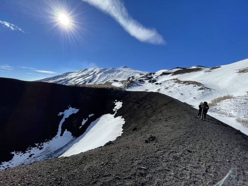 Mount Etna: Craters of the 2002 Eruption Trekking Experience - Walking the road toward the upper craters