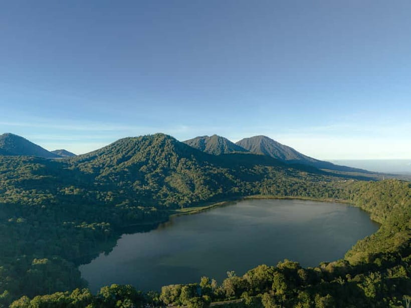 Munduk Jungle Trek: Twin Lakes View, Temple and Waterfall - Paddling across the cool water to Pura Dalem Tamblingan