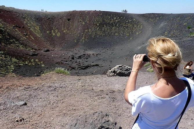 One Day Tour in Catania and Trekking on Etna - Entering an Etna volcanic cave by helmet and torch