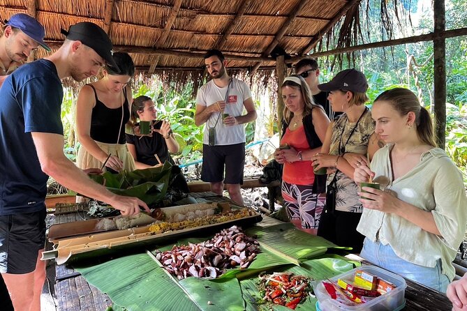 One Day Trekking Chiang Rai Jungle Adventure and Bamboo Cooking - Walking through tea plantations