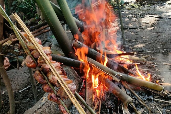 One Day Trekking Chiang Rai Jungle Adventure and Bamboo Cooking - Making lunch from bamboo