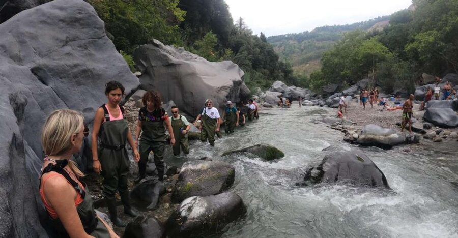 River Trekking Gole Alcantara - Walking into the Alcantara Gorge in high boots