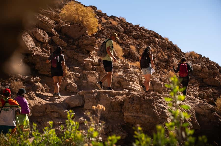 San Pedro de Atacama: Canyon Swimming Pools Trekking Trip - Walking into Puritama’s river canyon