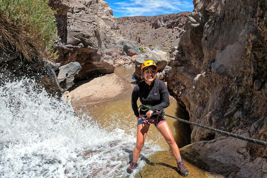 San Pedro de Atacama: Desert Tour with Canyoning & Trekking - Water in a desert canyon
