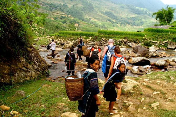 Sapa 3 Days Trekking Tour (1 Night in Bungalow, 1 Night In Hotel) - Ta Van after dark: family food and basic facilities