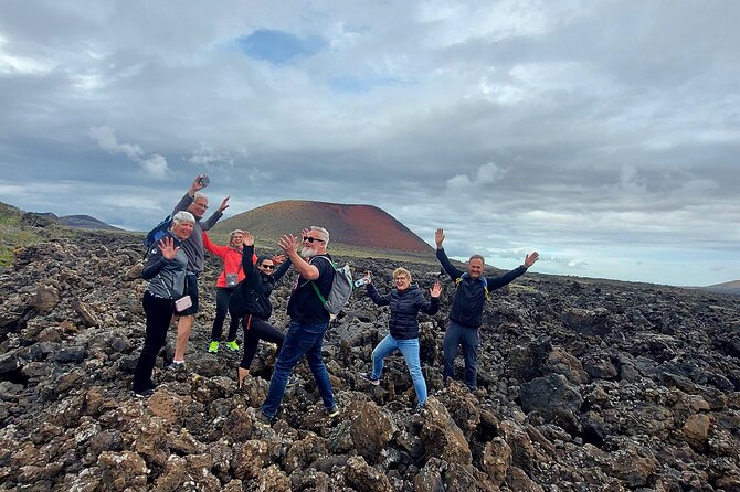 Trekking in the Volcanoes Natural Park in a small group - Sunset, quiet pauses, and the human side of the tour