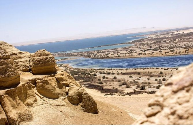 Valley of whale's & Al Fayoum by jeep 4<em>4 – private Desert full Day Trek – Cairo – Key points at a glance’ /></p>
<ul>
<li><strong>Whale Valley fossils:</strong> Walk marked desert trails among some of the world’s largest concentration of intact whale fossils.</li>
<li><strong>Private transport:</strong> Your group travels in an air-conditioned vehicle, with Wi-Fi on board and no strangers sharing the day.</li>
<li><strong>Wadi El Rayan waterfalls:</strong> See Egypt’s unusual desert waterfalls and the surrounding nature reserve.</li>
<li><strong>Mudawara Mountain and Magic Lake:</strong> Take in broad desert views, rock formations, and the water of Fayoum’s famous lake area.</li>
<li><strong>Tunis Village lunch stop:</strong> Combine a local meal with handmade crafts and a look at village life.</li>
<li><strong>Cairo pickup:</strong> Start at 8:00 a.m. and return after a full day outside the capital.</li>
</ul>
<h2>Why Fayoum makes a fine break from Cairo</h2>
<p><img width="669" height="446" decoding="async" src=
